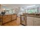 Kitchen with stainless steel appliances, granite countertops, and wood floors at 435 Chantenay Pl, Alpharetta, GA 30022