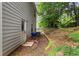 View of the backyard with wood privacy fence and back door at 10786 Wheeler Trce, Hampton, GA 30228