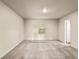 Spacious carpeted bedroom featuring a window for natural light at 10786 Wheeler Trce, Hampton, GA 30228