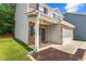 Inviting home with a covered porch and a well-kept lawn, showcasing the front entrance at 10786 Wheeler Trce, Hampton, GA 30228