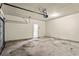 Spacious two car garage with door opener and ample room for storage at 10786 Wheeler Trce, Hampton, GA 30228