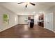 Spacious living room filled with natural light, seamlessly connected to the kitchen at 10786 Wheeler Trce, Hampton, GA 30228