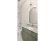 Bathroom featuring marble countertops, olive green cabinetry, and modern lighting at 11536 Serenbe Ln, Chattahoochee Hills, GA 30268