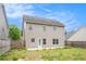Home backyard with a small patio and fencing at 196 Boulder Run, Hiram, GA 30141