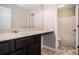 Bathroom with a vanity, sink, and countertop adjacent to the shower and toilet at 196 Boulder Run, Hiram, GA 30141