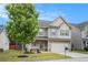 Charming home featuring a well-manicured lawn, beautiful landscaping, and a two car garage at 196 Boulder Run, Hiram, GA 30141