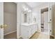 Well-lit bathroom features neutral paint colors, large mirror, and vanity at 250 Chason Wood Way, Roswell, GA 30076