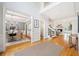Spacious foyer leading to the dining and living rooms featuring hardwood floors and an open floor plan at 250 Chason Wood Way, Roswell, GA 30076