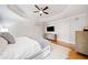 Bright and airy main bedroom features hardwood floors, modern decor, and ample closet space at 250 Chason Wood Way, Roswell, GA 30076