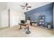 Large office with custom shelving and a vaulted ceiling at 250 Chason Wood Way, Roswell, GA 30076