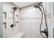 Walk-in shower features dual shower heads, built-in shelving, and a shower bench at 250 Chason Wood Way, Roswell, GA 30076