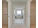 En-suite bathroom featuring a free-standing tub and plenty of natural light at 520 Dulles Dr, Mcdonough, GA 30253