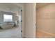 Bathroom entryway with a soaking tub view and access to walk-in closet at 520 Dulles Dr, Mcdonough, GA 30253