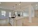 Spacious kitchen with island, stainless steel dishwasher and farmhouse sink at 520 Dulles Dr, Mcdonough, GA 30253