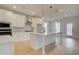Modern kitchen featuring white cabinets, quartz countertops, and stainless steel appliances at 520 Dulles Dr, Mcdonough, GA 30253