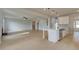 Open-concept living room featuring hardwood floors and ample natural light at 520 Dulles Dr, Mcdonough, GA 30253