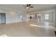 Spacious living room next to open concept kitchen, stairs, and hardwood floors at 520 Dulles Dr, Mcdonough, GA 30253