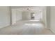 Bright main bedroom featuring tray ceiling, ceiling fan, and neutral decor at 520 Dulles Dr, Mcdonough, GA 30253