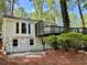 Charming two-story home featuring a brick facade and a spacious deck at 1230 Sunderland Ne Ct, Brookhaven, GA 30319