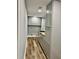 Modern laundry room boasting gray cabinets, wood countertop, and ample storage space at 1230 Sunderland Ne Ct, Brookhaven, GA 30319