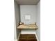 Cozy office nook with floating desk and overhead lighting at 1230 Sunderland Ne Ct, Brookhaven, GA 30319