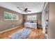 Bedroom with hardwood floors and two windows at 14300 Veterans Memorial Highway, Villa Rica, GA 30180