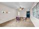 Bright living room with carpet flooring and a dark door at 14300 Veterans Memorial Highway, Villa Rica, GA 30180