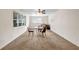 Bright living room with neutral carpet, ceiling fan and natural light from the windows at 14300 Veterans Memorial Highway, Villa Rica, GA 30180