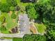 Top-down view of home with a well-maintained yard, patio area and fire pit at 150 Victoria Sta, Woodstock, GA 30189