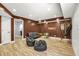 Finished basement with wood-look tile flooring, recessed lights, and room for recreation at 150 Victoria Sta, Woodstock, GA 30189