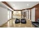 Finished basement includes tile floors, recessed lighting, built-in cabinets, and double doors to the exterior at 150 Victoria Sta, Woodstock, GA 30189