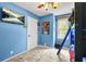 A bedroom features light blue walls and a carpeted floor with a bunkbed and window at 150 Victoria Sta, Woodstock, GA 30189