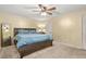 Bedroom with soft carpet, ceiling fan and queen sized bed at 150 Victoria Sta, Woodstock, GA 30189