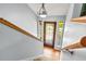 This beautiful entryway features a wooden front door with leaded glass and oak handrails at 150 Victoria Sta, Woodstock, GA 30189