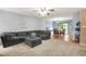 Spacious living room seamlessly connects to the dining area, perfect for entertaining and everyday living at 150 Victoria Sta, Woodstock, GA 30189