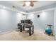 Home office space with a ceiling fan, neutral carpet, and great natural light at 150 Victoria Sta, Woodstock, GA 30189