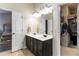 Bathroom featuring a double sink vanity and a walk-in closet at 1945 Bay Beauty Ln # 10, Austell, GA 30106