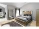Bright bedroom featuring plush carpeting, a large mirror, and lots of natural light at 1945 Bay Beauty Ln # 10, Austell, GA 30106