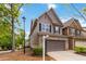 Charming two-story home with a brick facade, attached garage, and well-maintained landscaping at 1945 Bay Beauty Ln # 10, Austell, GA 30106