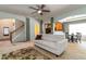 Bright living room with neutral tones, featuring a comfortable sofa, open layout, and seamless flow to the kitchen at 1945 Bay Beauty Ln # 10, Austell, GA 30106