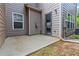 Enclosed patio featuring gray siding and a sliding glass door at 1945 Bay Beauty Ln # 10, Austell, GA 30106