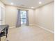 Bedroom featuring a window and neutral carpet at 28106 Plantation Ne Dr, Atlanta, GA 30324
