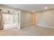 Bright bedroom with double doors and neutral carpet at 28106 Plantation Ne Dr, Atlanta, GA 30324