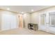 This spacious bedroom features neutral walls, carpet, walk-in closet, and french doors at 28106 Plantation Ne Dr, Atlanta, GA 30324