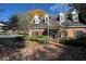Brick building exterior featuring dormer windows and a well-manicured lawn at 28106 Plantation Ne Dr, Atlanta, GA 30324