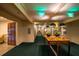 Hallway view showcasing sconces and wood table with fresh floral arrangement and 'exit' sign at 28106 Plantation Ne Dr, Atlanta, GA 30324