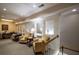 Cozy living room area, featuring a carpeted floor, lamps, and stairway at 28106 Plantation Ne Dr, Atlanta, GA 30324