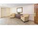 Relaxing lobby area with comfortable seating and decorative accents in a neutral color palette at 28106 Plantation Ne Dr, Atlanta, GA 30324