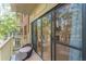 Patio with sliding glass doors overlooking the treed backyard at 28106 Plantation Ne Dr, Atlanta, GA 30324
