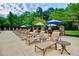 Relaxing pool deck with lounge chairs and tables, perfect for outdoor enjoyment at 28106 Plantation Ne Dr, Atlanta, GA 30324